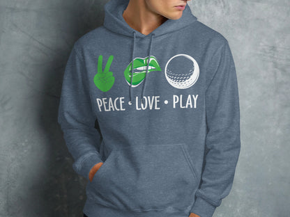 Blue hoodie with green peace sign, lips, and golf ball graphic and text.