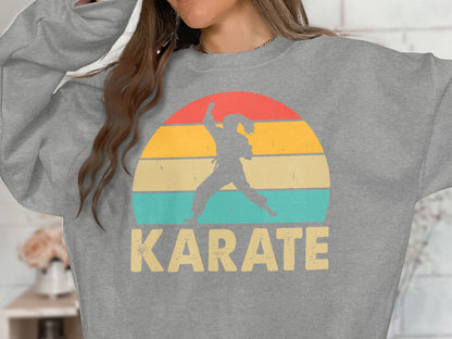 Grey sweatshirt with retro sunset graphic and "Karate" text.