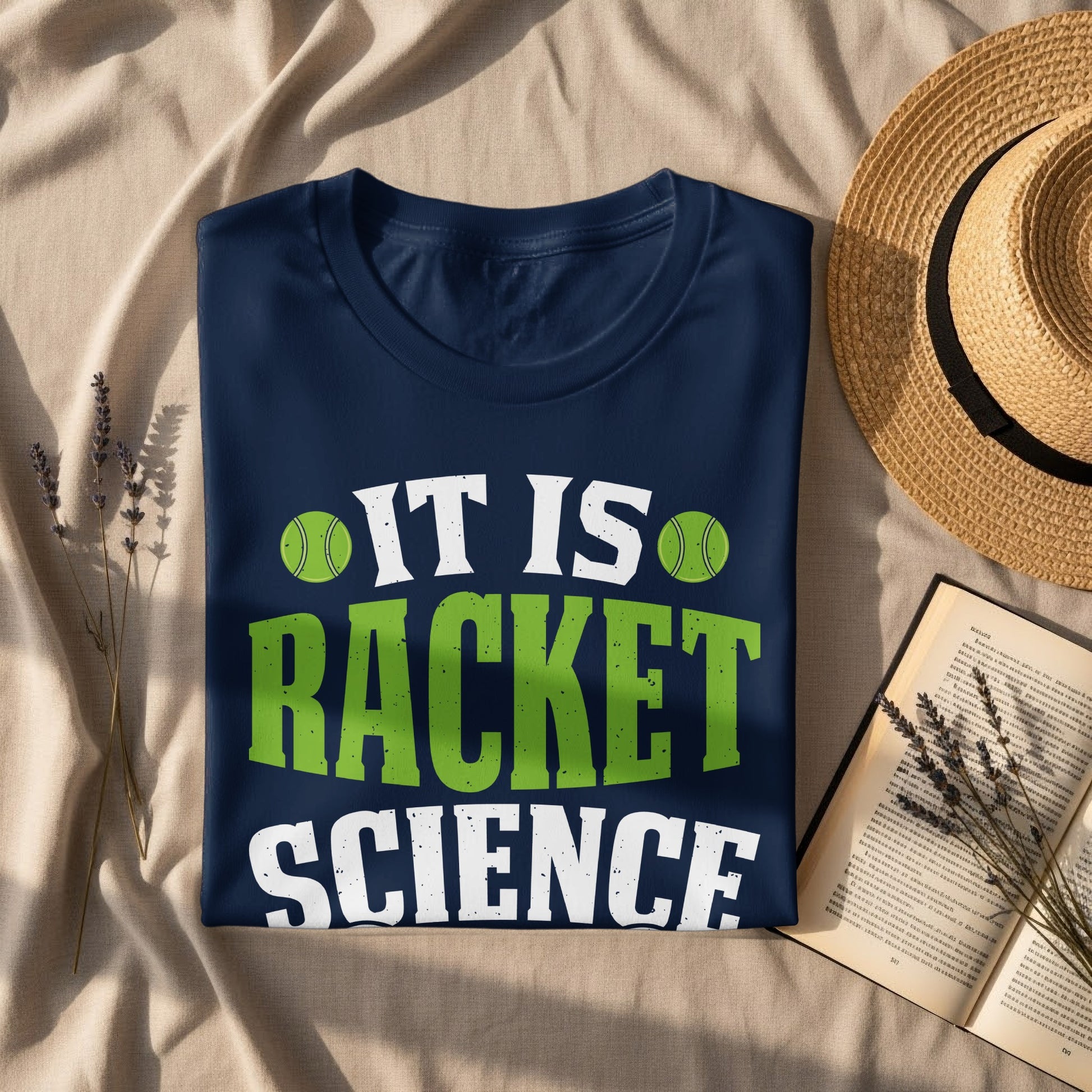 Dark blue t-shirt with "IT IS RACKET SCIENCE" in green text.