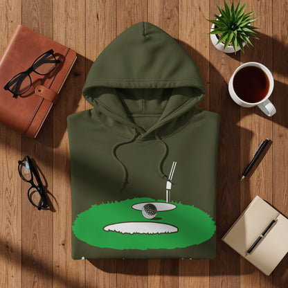 Green hoodie with golf course graphic featuring a ball, tee, and sand trap.