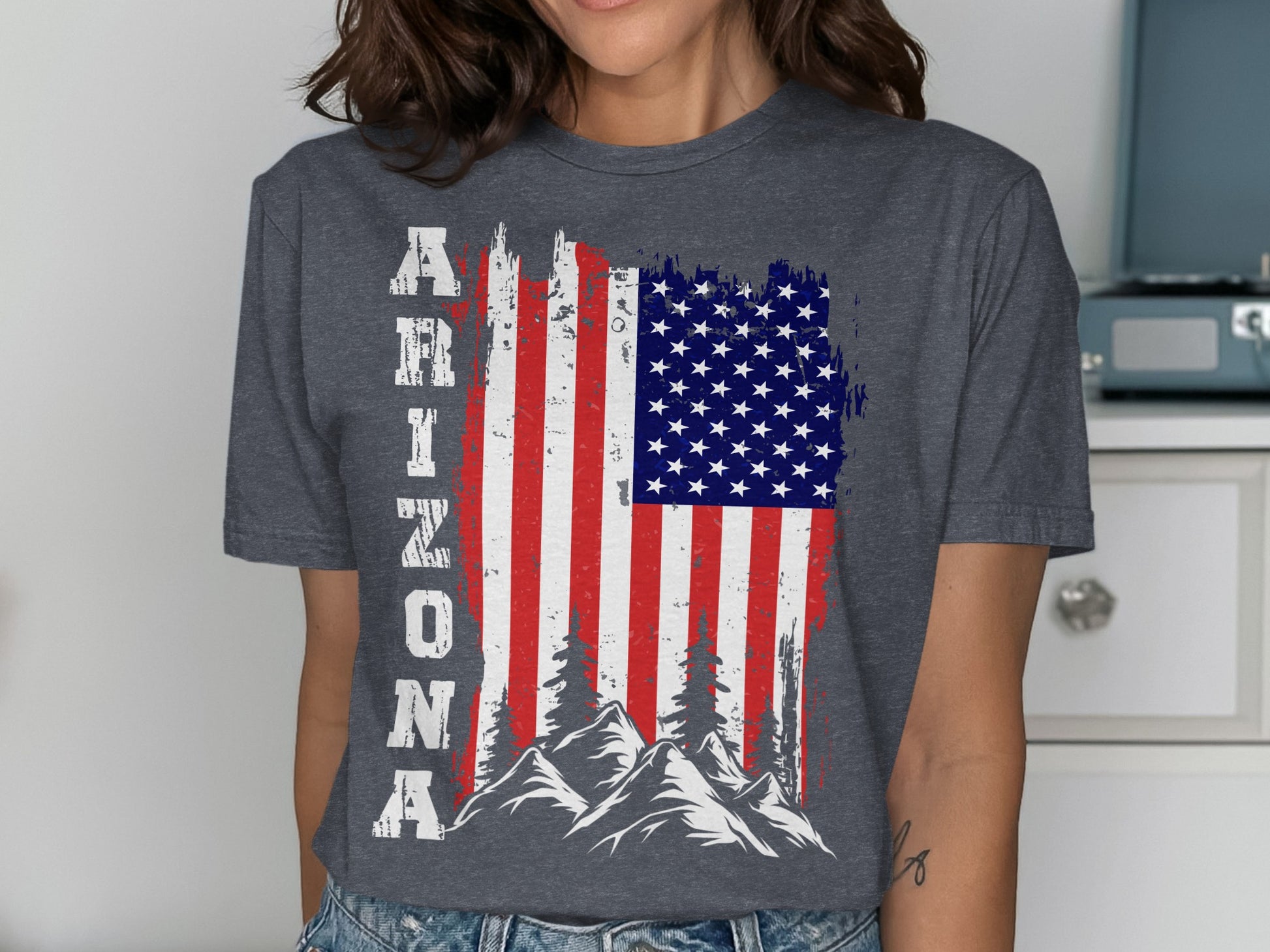 Distressed Arizona flag with mountains and text on a grey t-shirt.