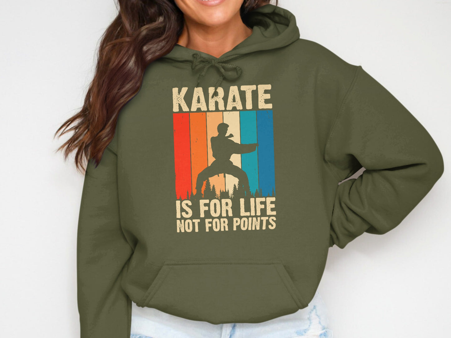 Khaki hoodie with retro sunset graphic and text "Karate is for life not for points".