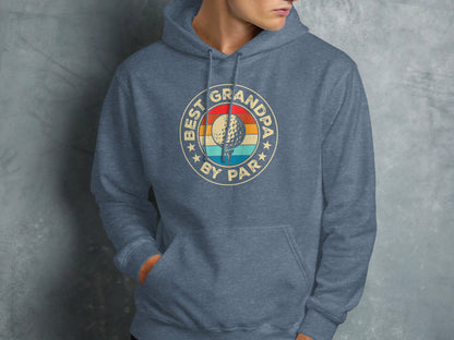 Best Grandpa by Par text and golf ball graphic on a blue hoodie.