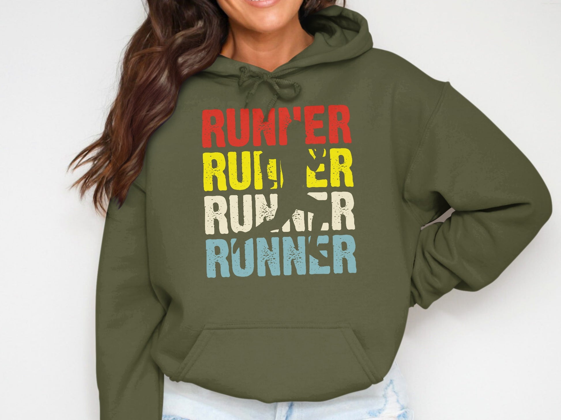 Green hoodie with "RUNNER" text in red, yellow, and blue, featuring a running silhouette.