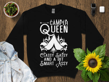 Black sweatshirt with "Camper Queen Classy Sassy and a Bit Smart Assy" text.
