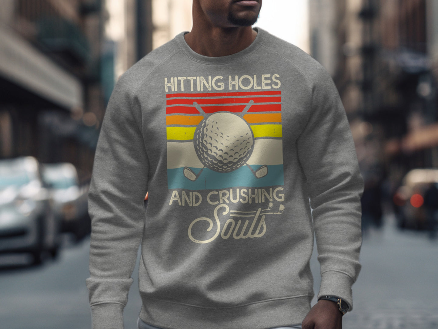 Gray sweatshirt with a vintage golf design: "Hitting Holes And Crushing Souls".