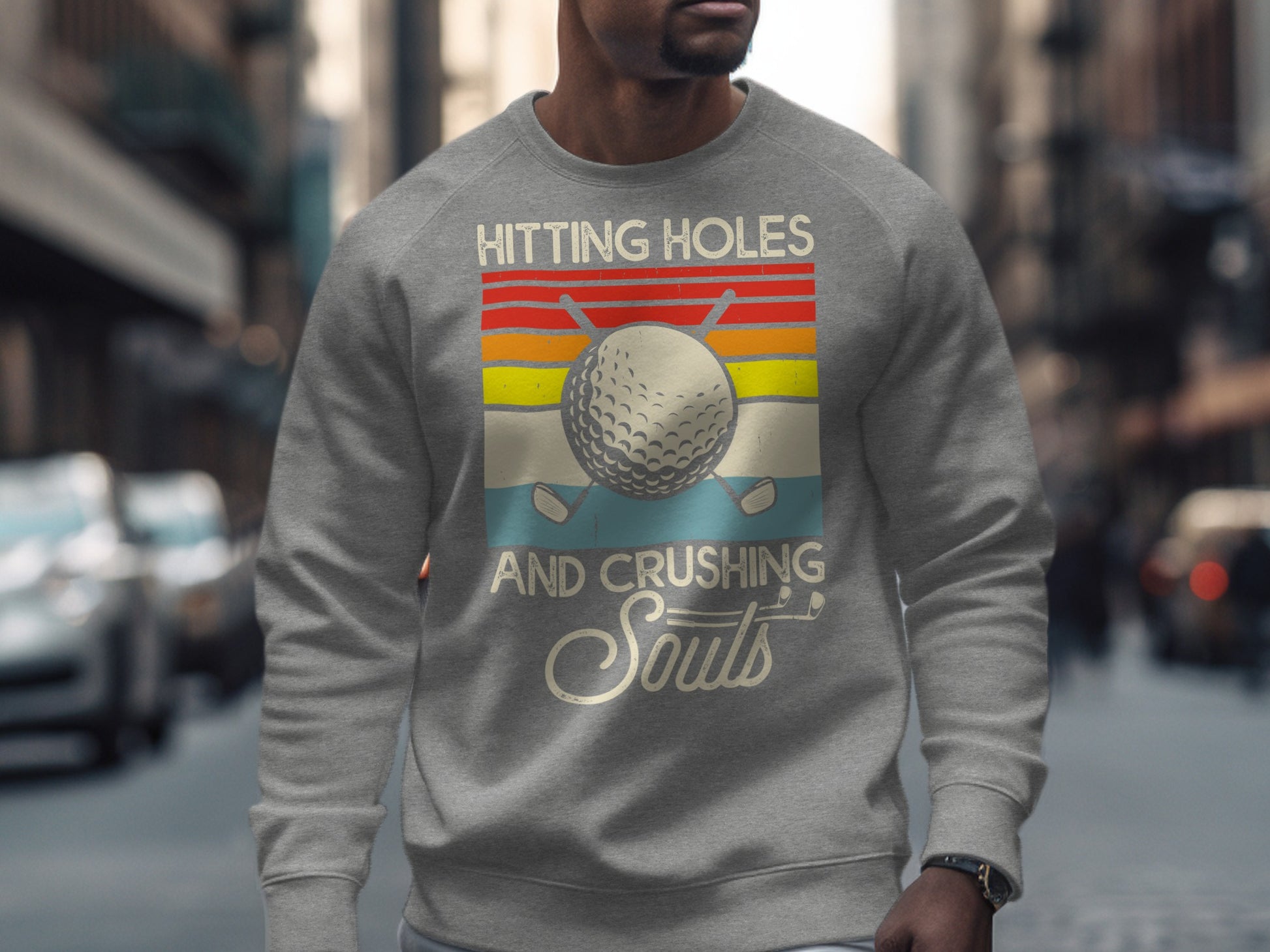 Gray sweatshirt with a vintage golf design: "Hitting Holes And Crushing Souls".