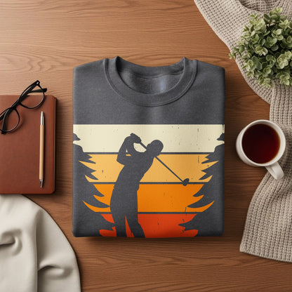 Dark sweatshirt with vintage golfer silhouette and striped sunset background.