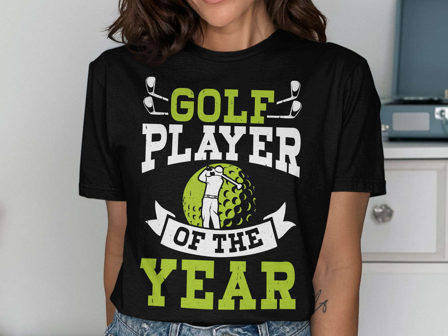 Black t-shirt with "Golf Player of the Year" text and golfer illustration.