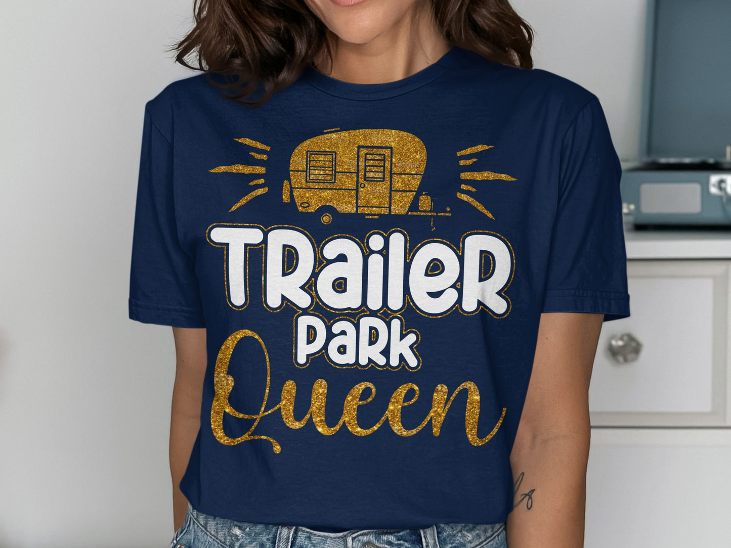 Dark navy t-shirt with "Trailer Park Queen" in glittery gold and white text.