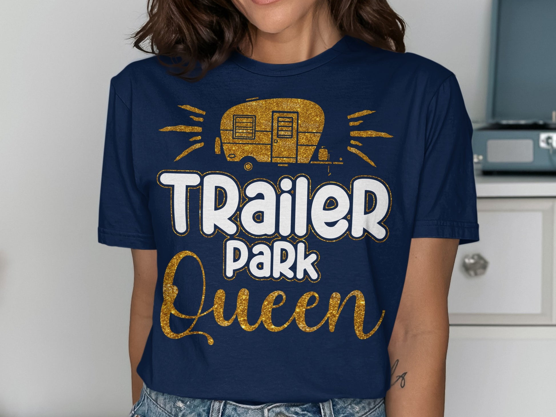 Dark navy t-shirt with "Trailer Park Queen" in glittery gold and white text.