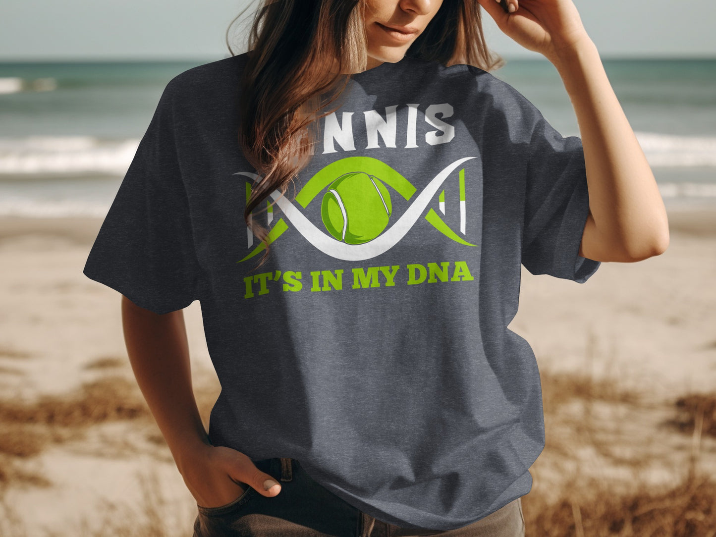 Dark t-shirt with green tennis ball and "Tennis It's In My DNA" text.