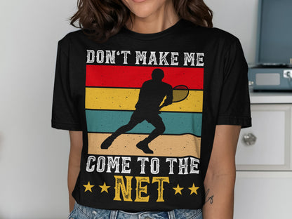 Black t-shirt with retro stripes and tennis player silhouette, text reads "Don't make me come to the net."