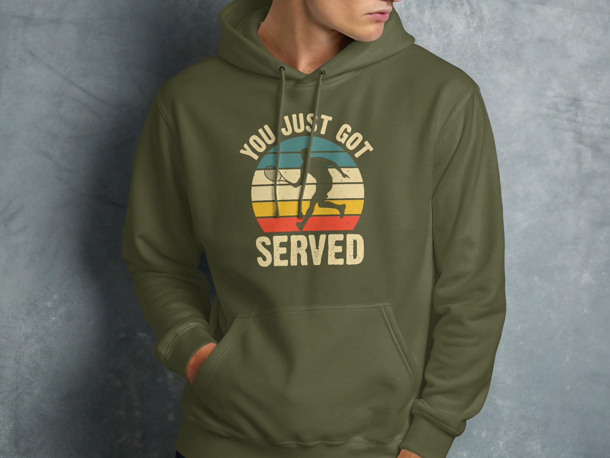 Olive green hoodie with "YOU JUST GOT SERVED" text and tennis player graphic.