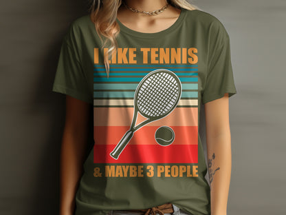Green t-shirt with "I LIKE TENNIS & MAYBE 3 PEOPLE" and tennis racket/ball graphic.