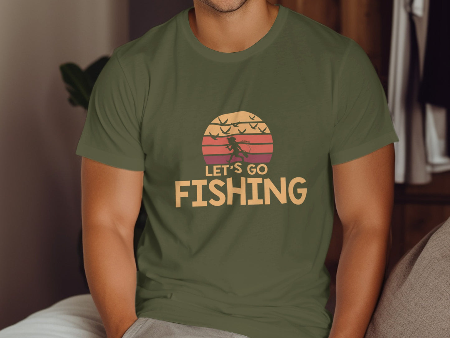 Green t-shirt with "LET'S GO FISHING" text and a sunset fishing graphic.