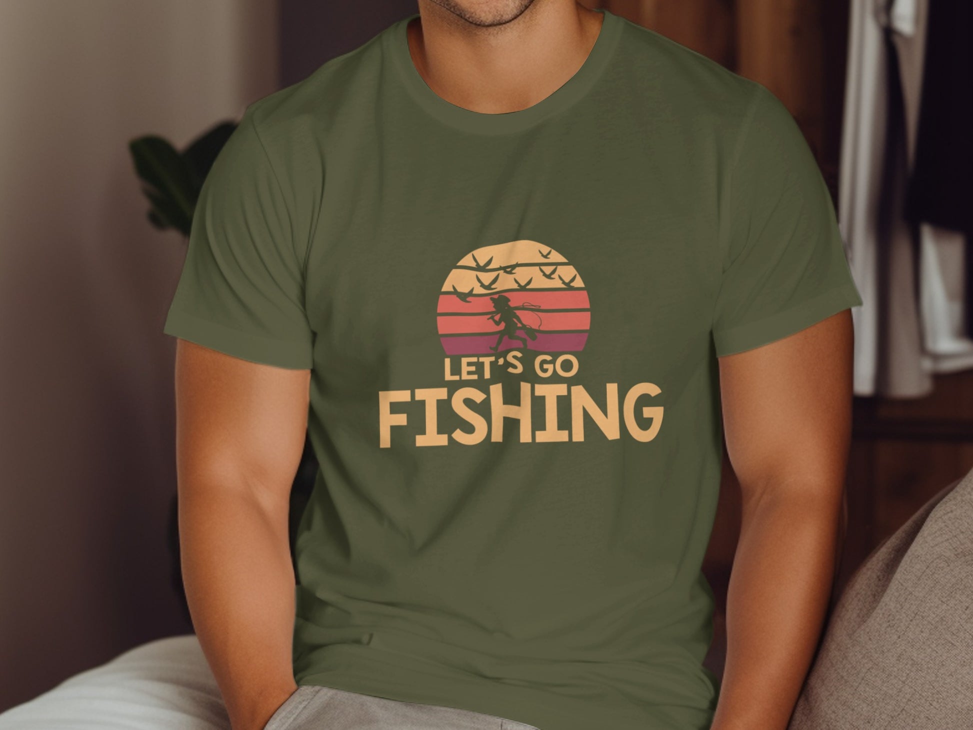 Green t-shirt with "LET'S GO FISHING" text and a sunset fishing graphic.