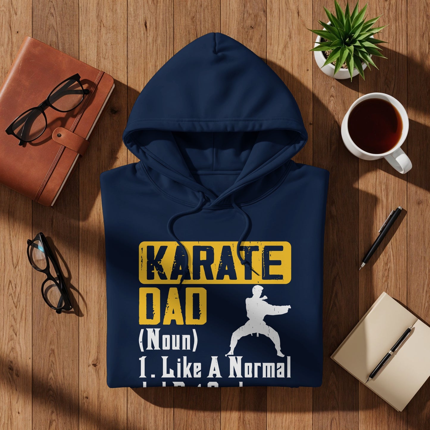 Navy hoodie with "Karate Dad 1. Like a Normal" text and karate silhouette.