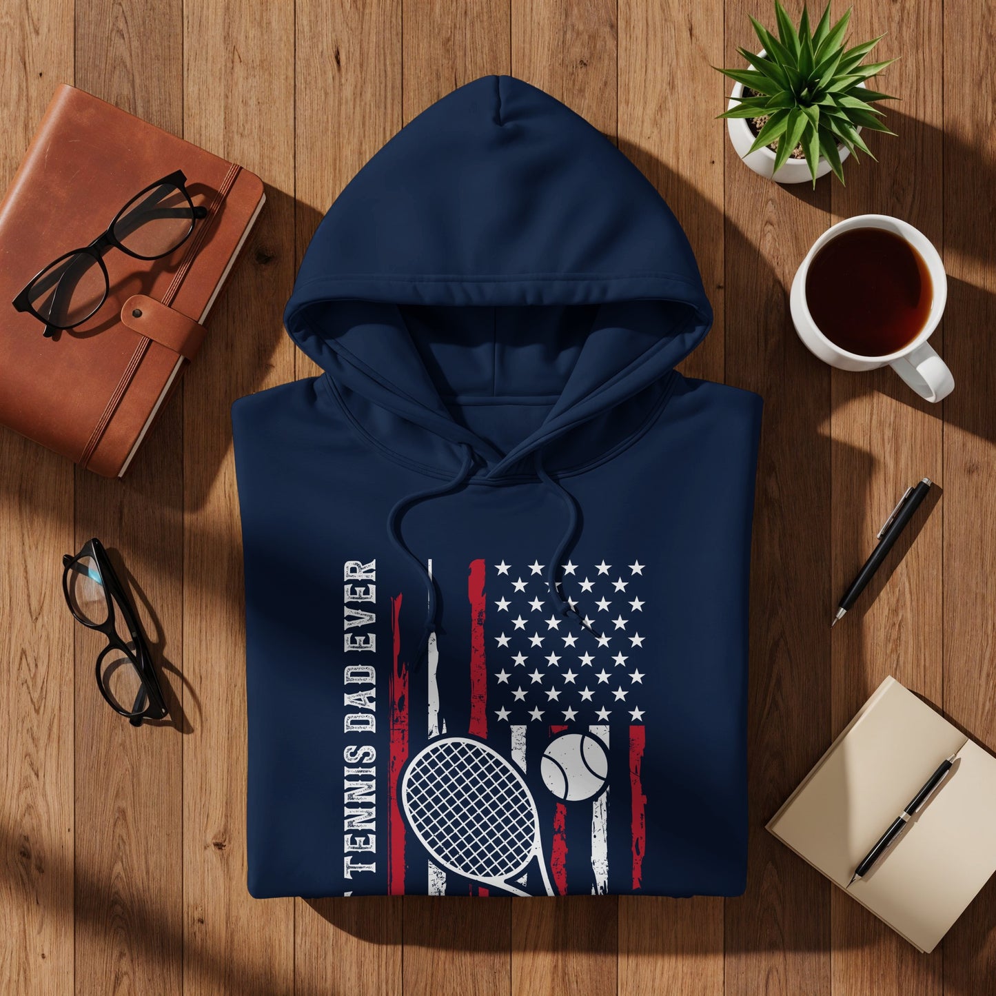 Navy hoodie with distressed American flag, tennis racket, and ball design.
