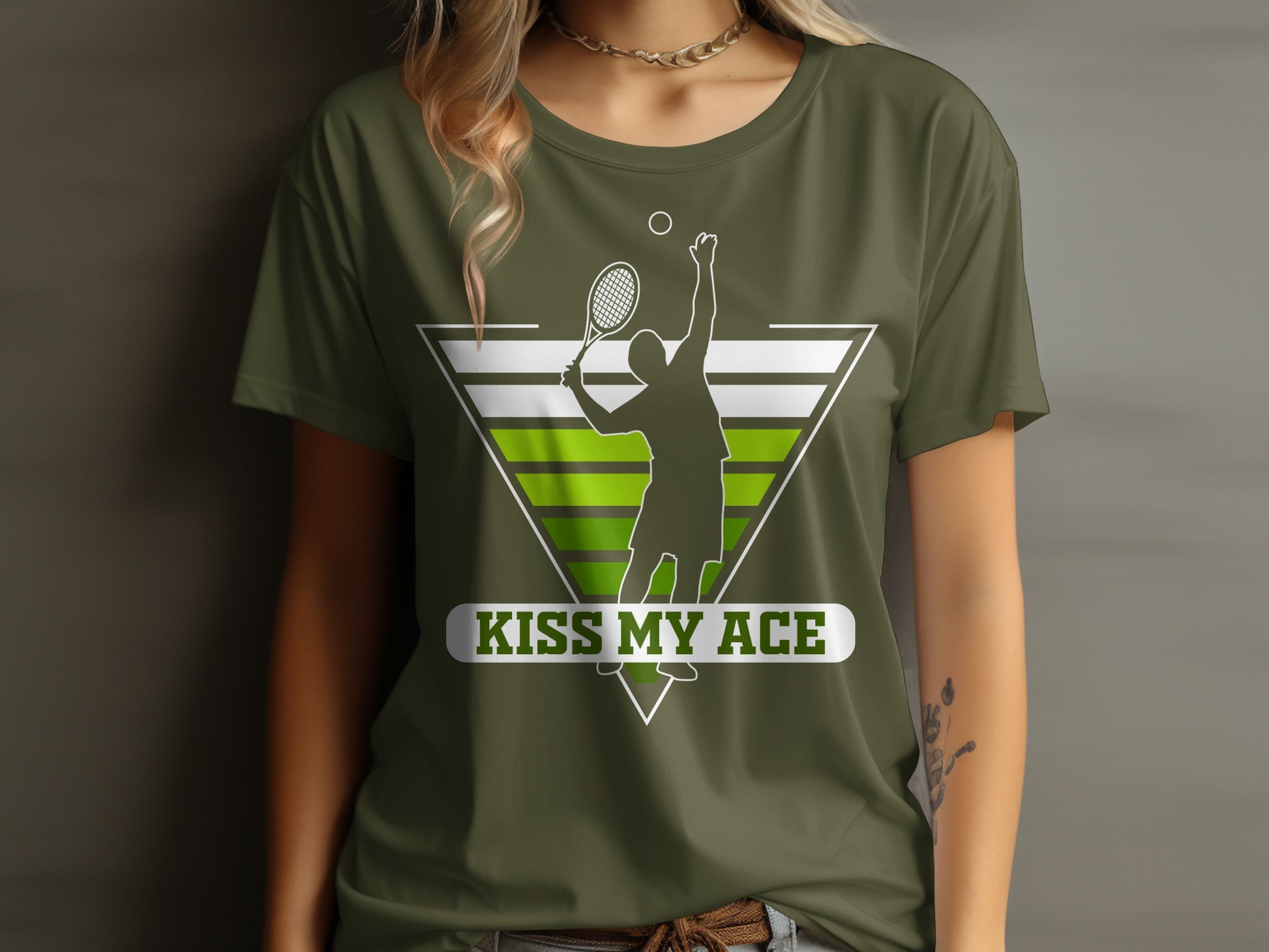 Green t-shirt with tennis player graphic and "Kiss My Ace" text.
