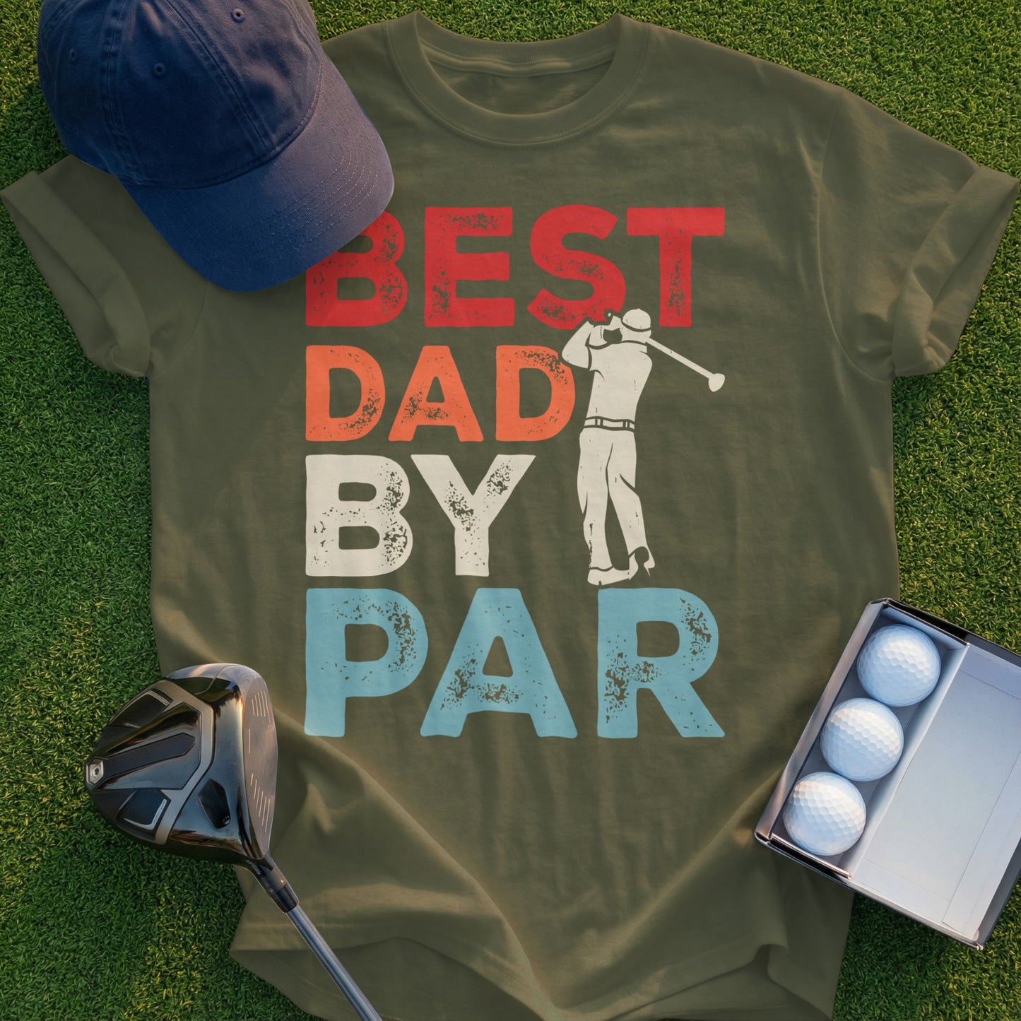 Olive t-shirt with "BEST DAD BY PAR" graphic and golfer illustration.
