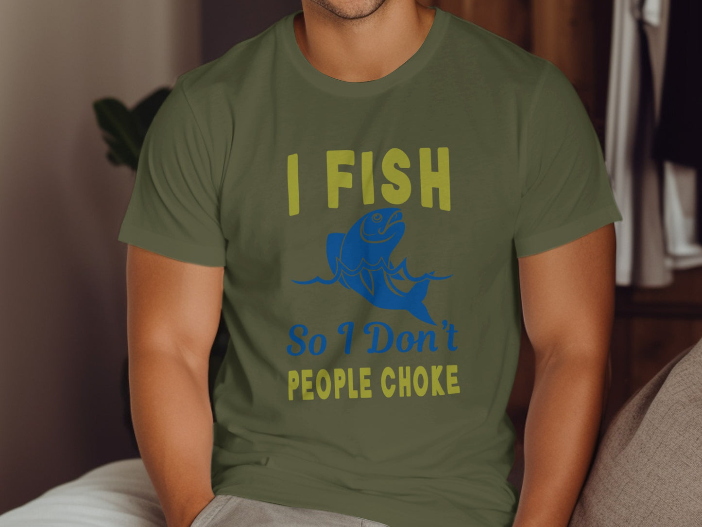 Olive green t-shirt with "I FISH So I Don't PEOPLE CHOKE" text and a leaping fish.