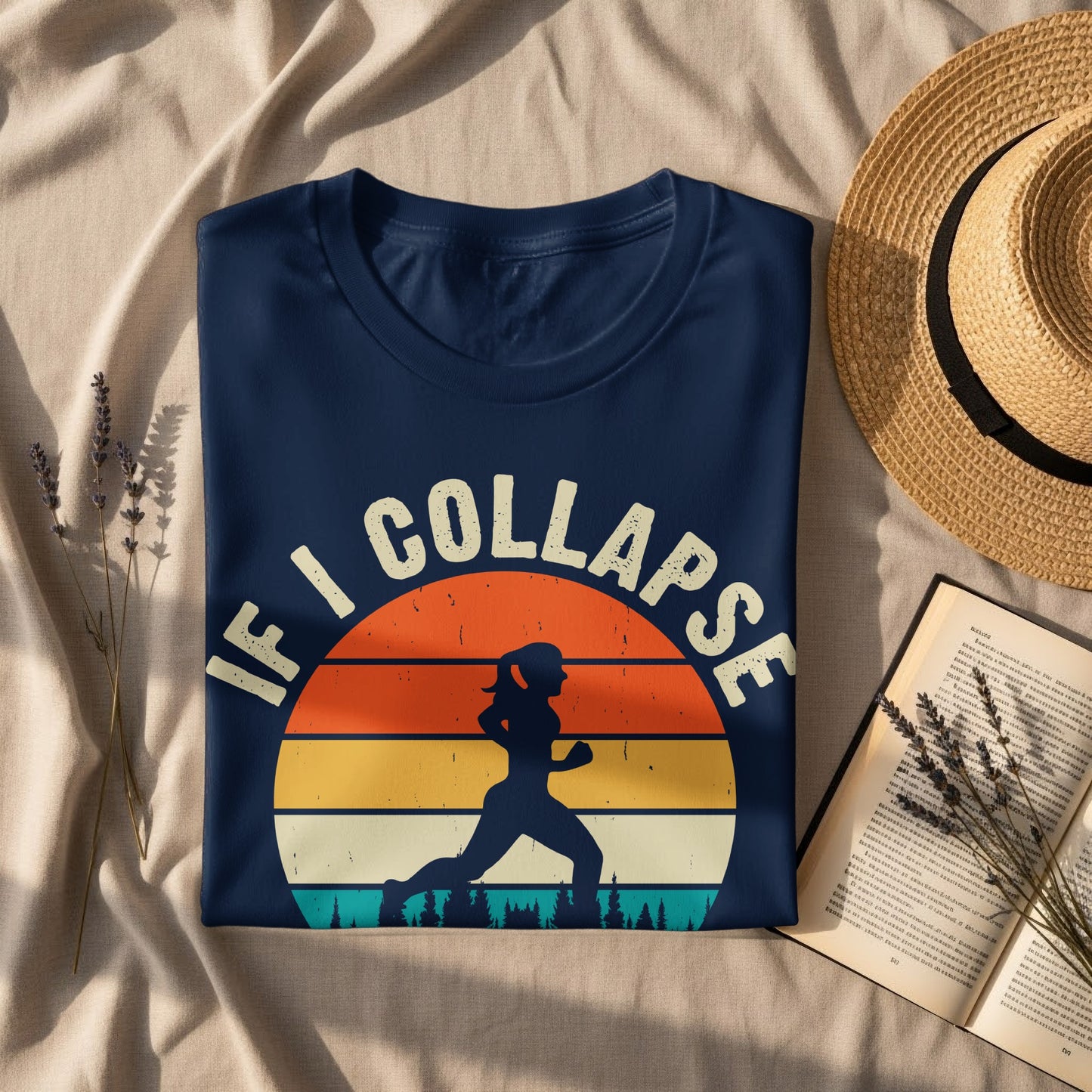 Dark blue t-shirt with "IF I COLLAPSE" and running silhouette on a sunset graphic.