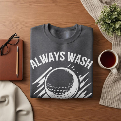 Dark gray sweatshirt with "ALWAYS WASH" and a golf ball graphic.