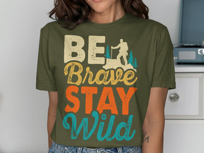 T-shirt with "BE Brave STAY Wild" text and hiker silhouette graphic.