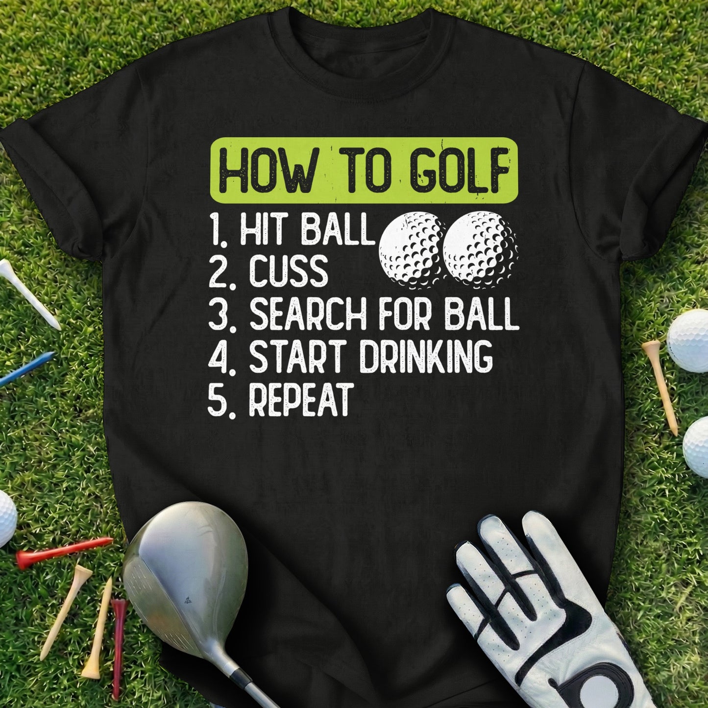 Black t-shirt with humorous "How to Golf" instructions and golf balls.