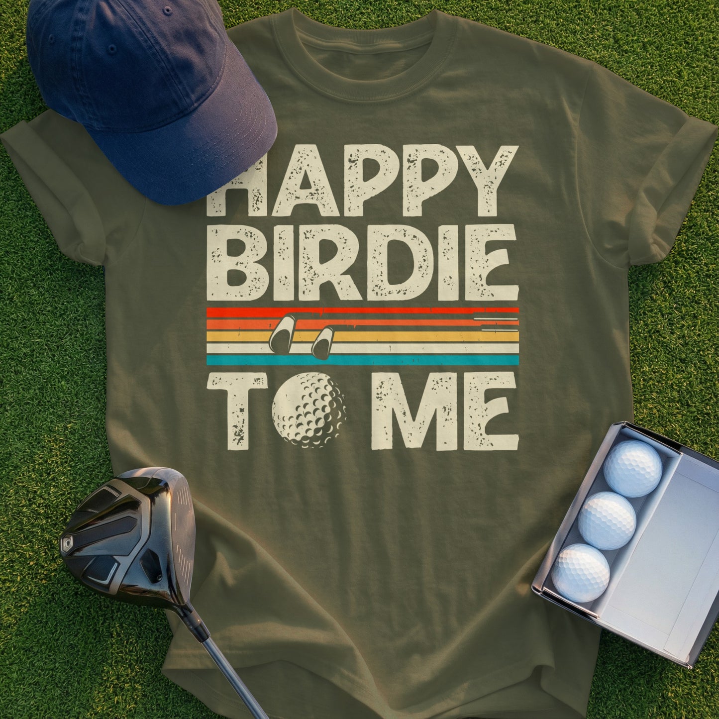 Green t-shirt with "Happy Birdie To Me" text and golf ball graphic.