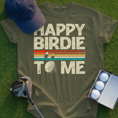 Green t-shirt with "Happy Birdie To Me" text and golf ball graphic.