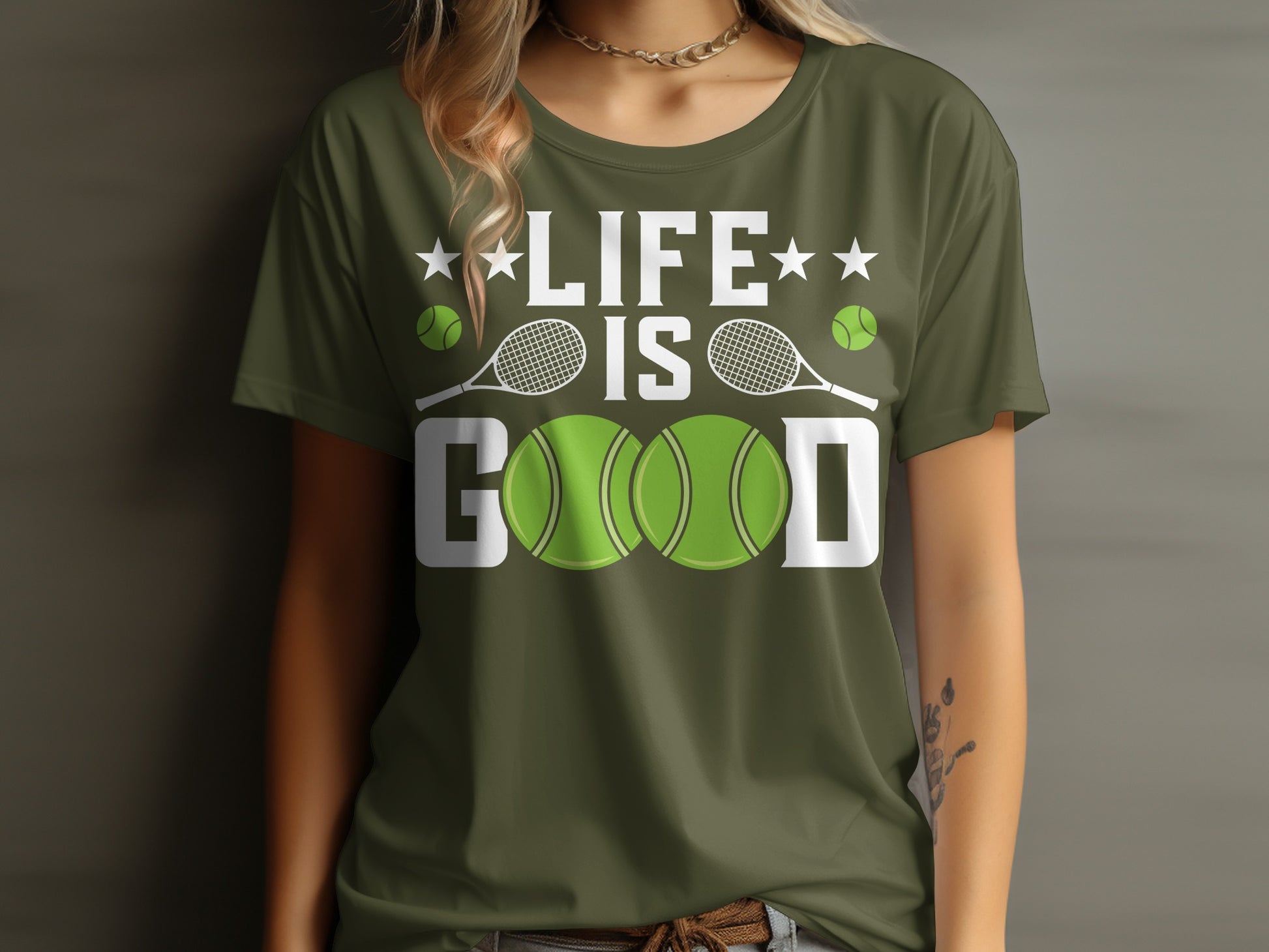 Green t-shirt with "LIFE IS GOOD" and tennis balls.