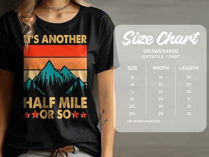 Black t-shirt with retro mountain graphic and "IT'S ANOTHER HALF MILE OR SO" text.