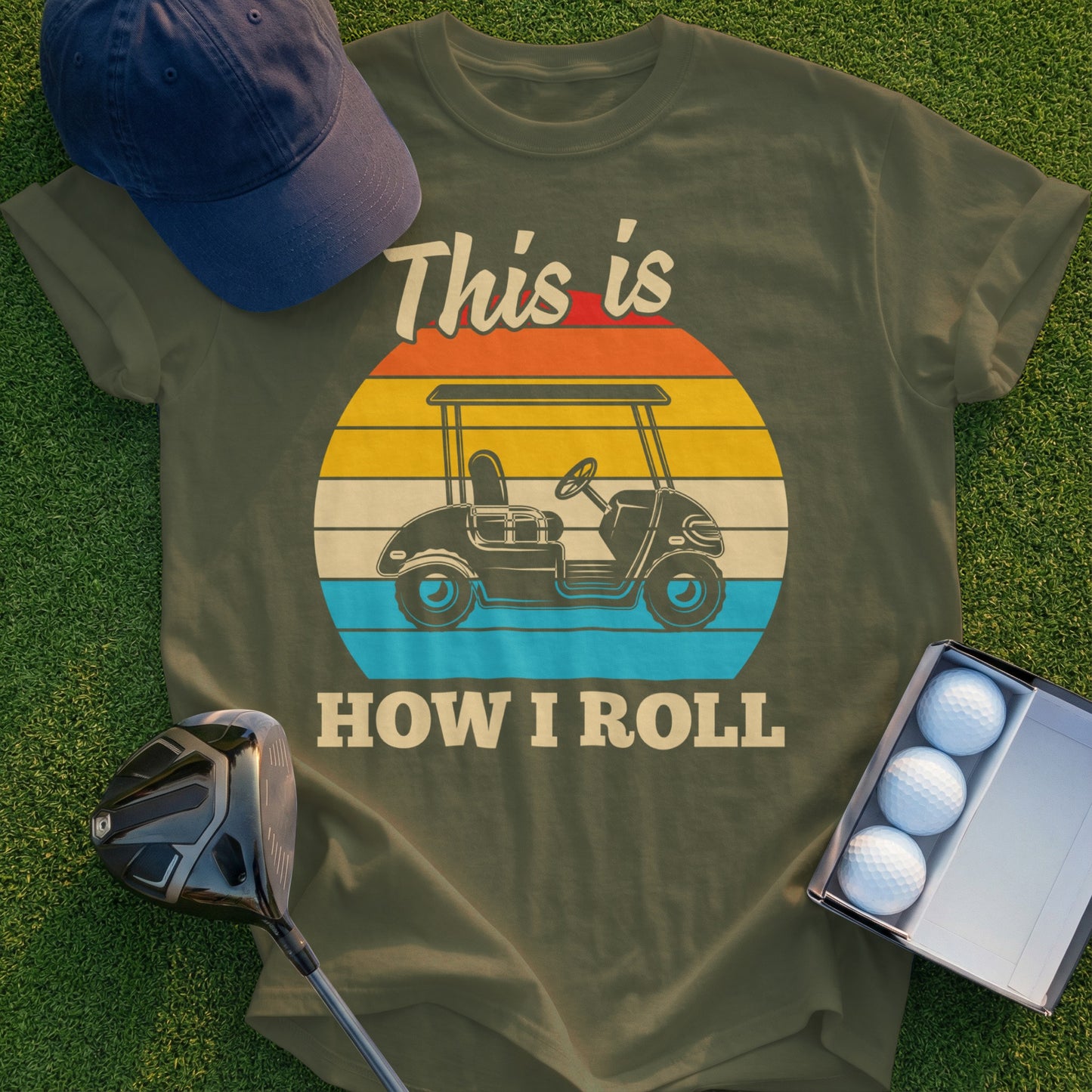 Olive t-shirt with "This is HOW I ROLL" and a golf cart graphic.