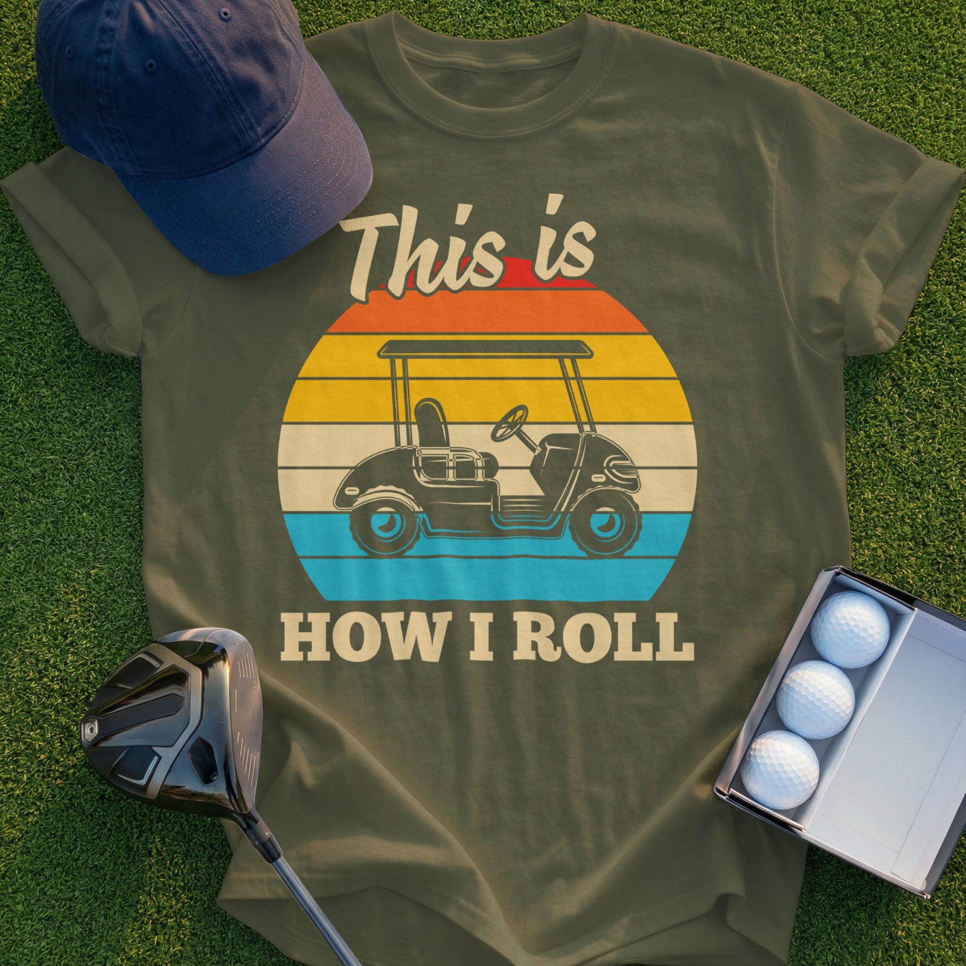 Olive t-shirt with "This is HOW I ROLL" and a golf cart graphic.