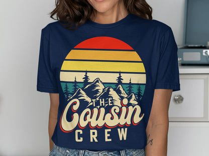 Navy t-shirt with "The Cousin Crew" text and mountain sunset graphic.