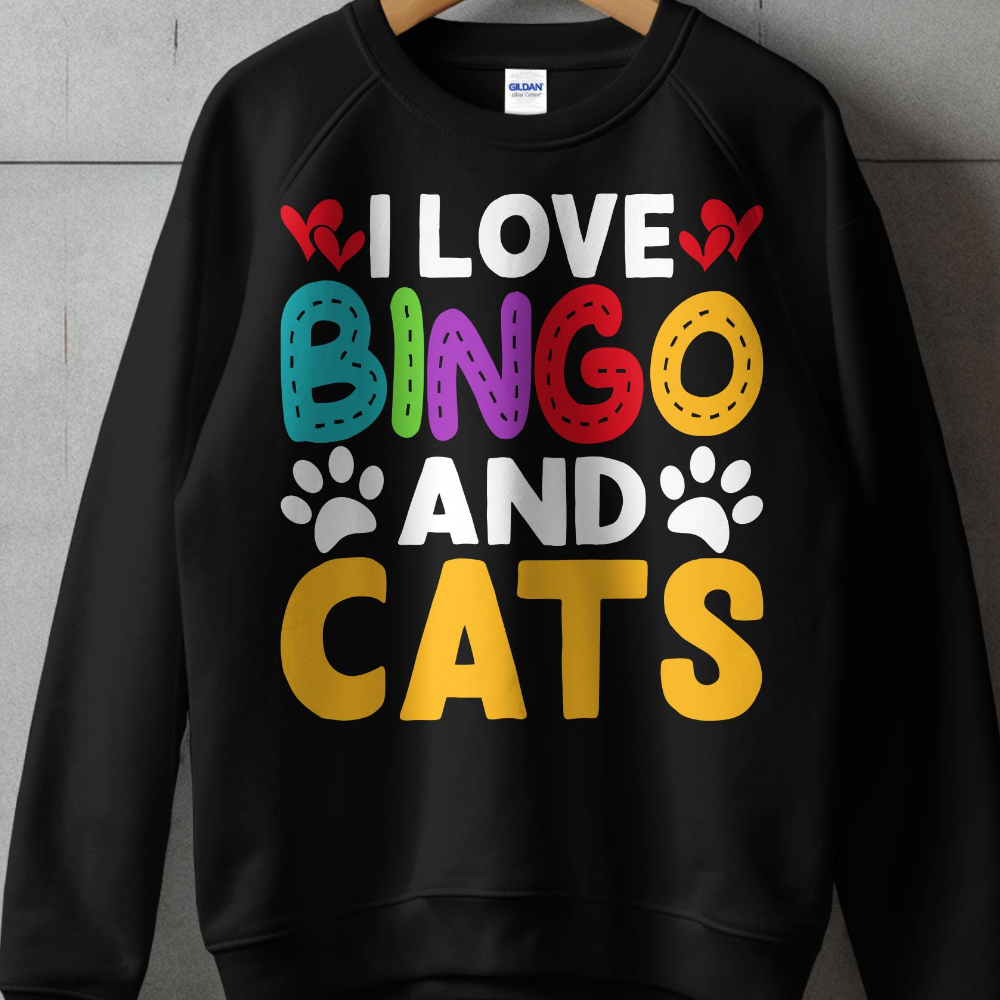 Black sweatshirt with "I Love Bingo and Cats" text and colorful heart, dot, and paw print graphics.