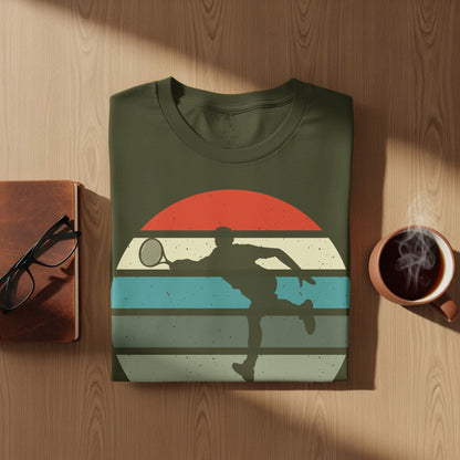 Olive green t-shirt with graphic of tennis player against striped sunset.