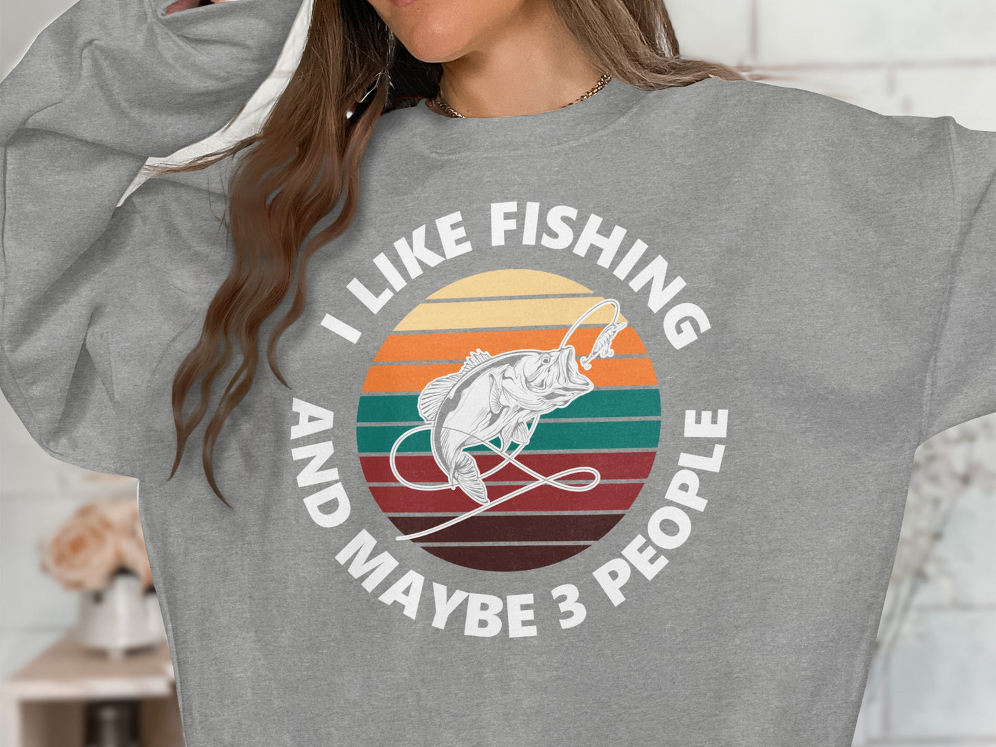 Gray sweatshirt with "I Like Fishing And Maybe 3 People" text and a fish graphic.