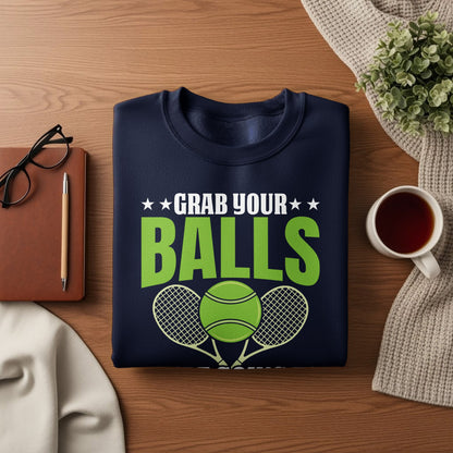 Navy sweatshirt with "Grab Your Balls" graphic and tennis rackets and balls.