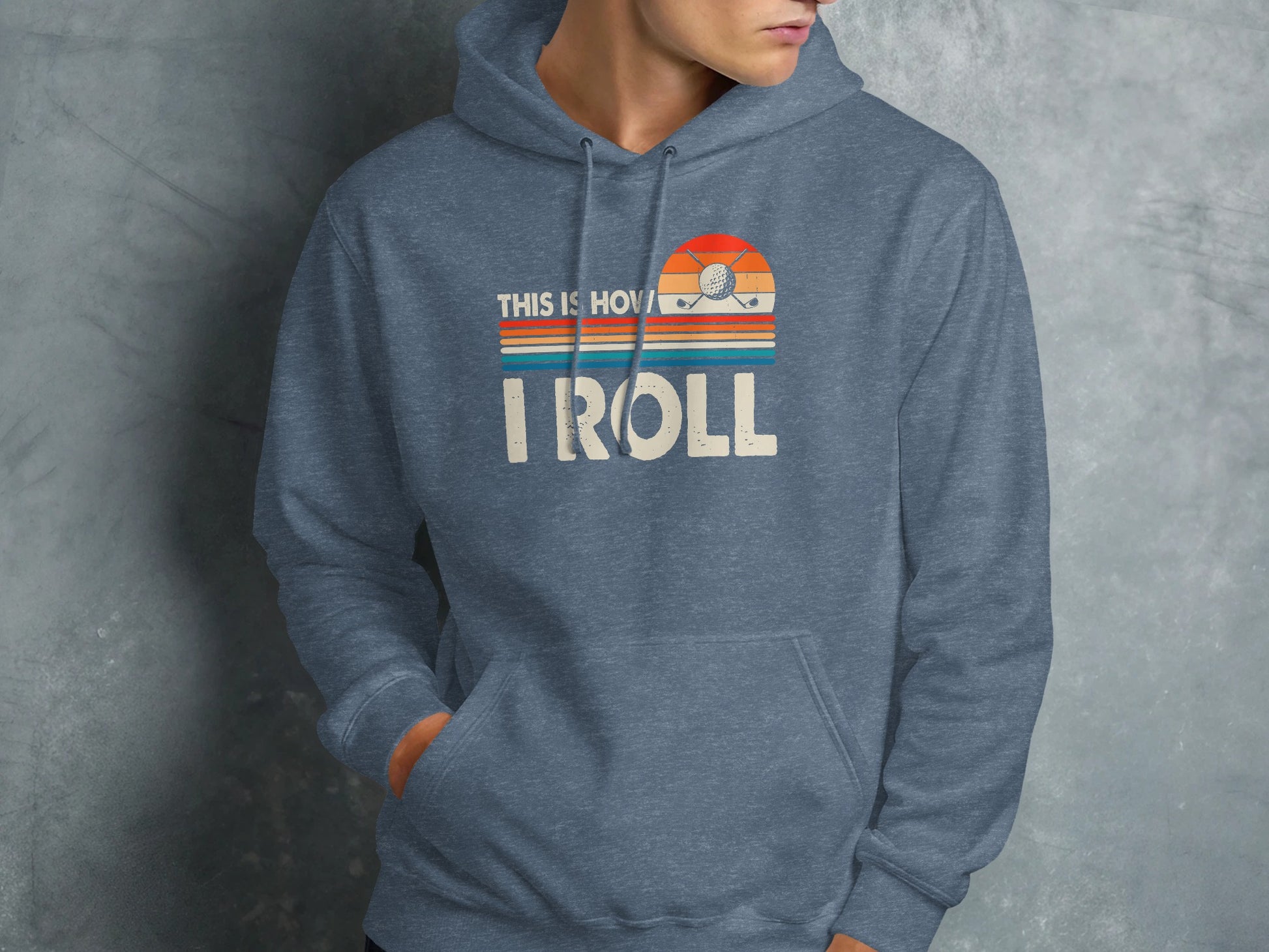 Blue hoodie with vintage "This is how I roll" golf graphic.