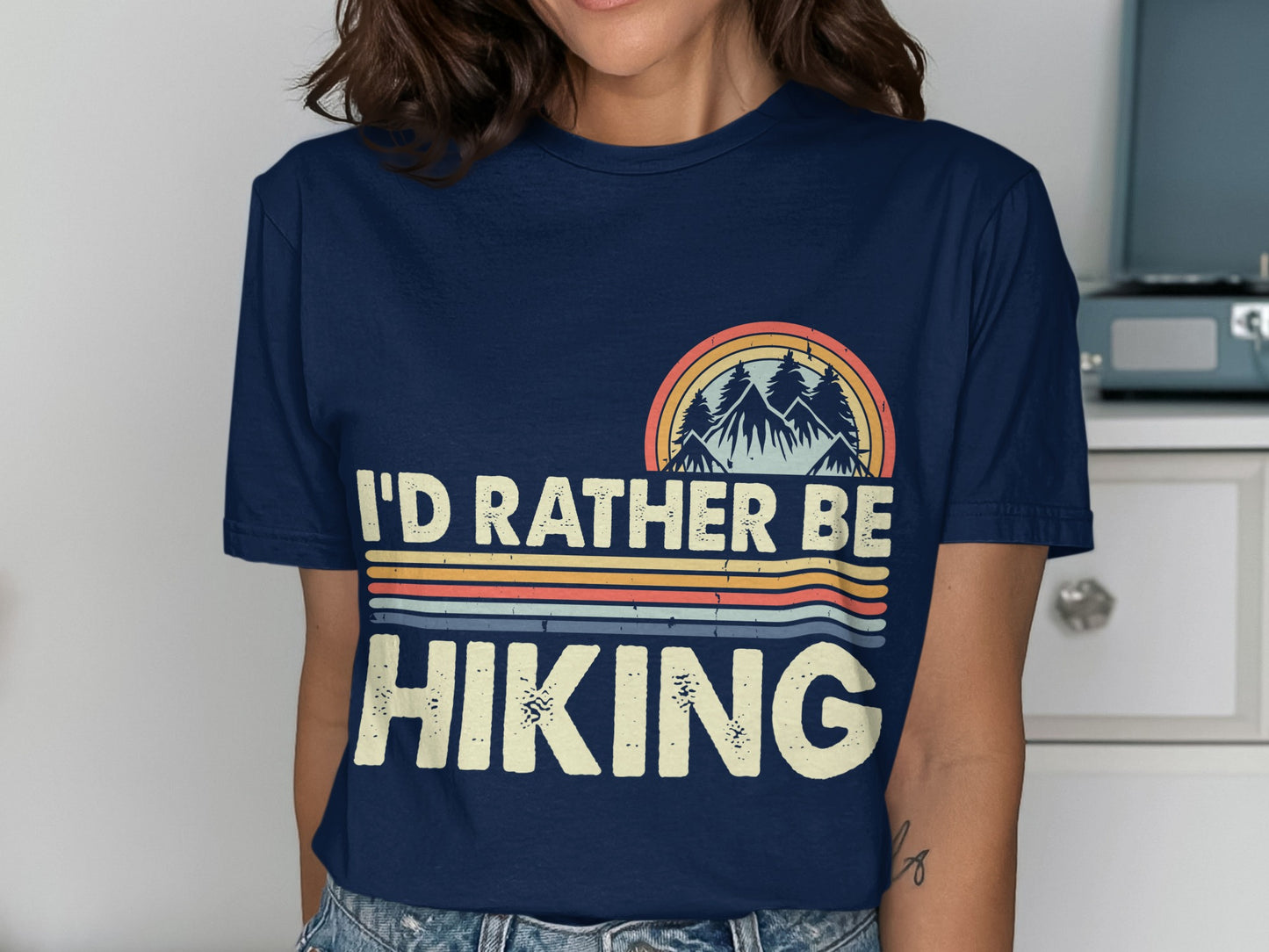 Navy t-shirt with "I'd Rather Be Hiking" graphic featuring mountains and rainbow stripes.