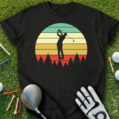 Black t-shirt with a golfer silhouette against a sunset and trees.
