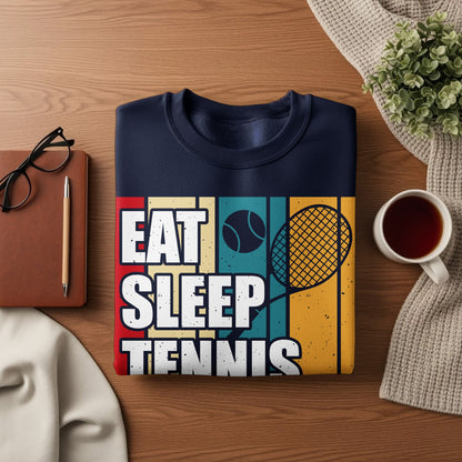 Navy sweatshirt with "EAT SLEEP TENNIS" text and tennis racket graphic.