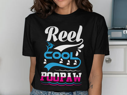 Black t-shirt with "Reel Cool Poopaw" text and fishing graphics.