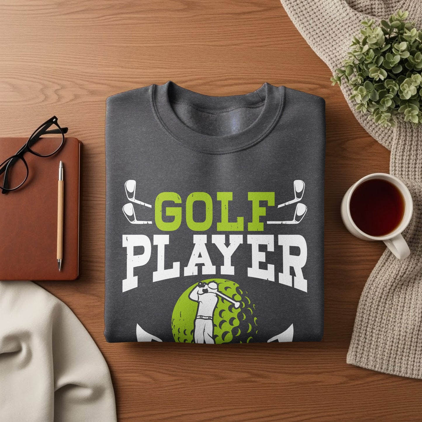 Gray sweatshirt with "GOLF PLAYER" text and golfer graphic.