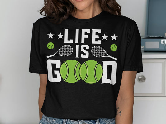 Black t-shirt with "LIFE IS GOOD" text, tennis rackets, and balls.