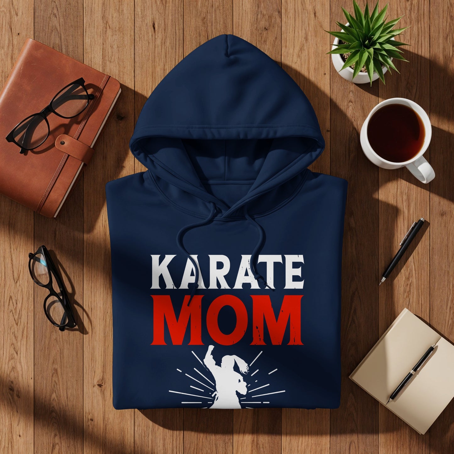 Navy hoodie with "KARATE MOM" text and karate silhouette graphic.