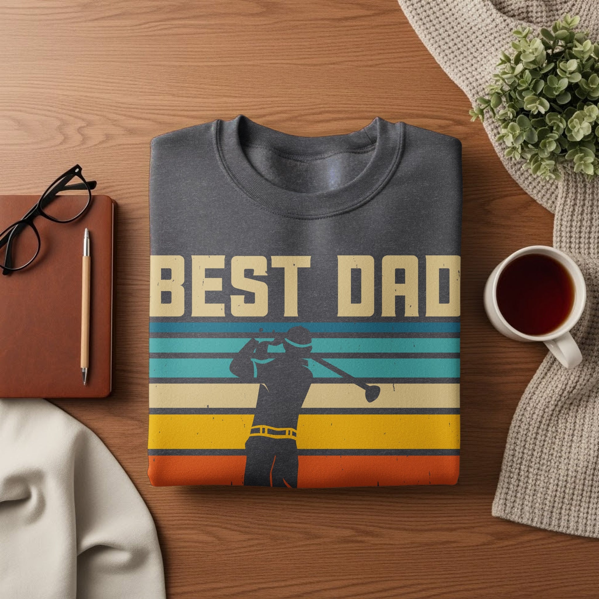 Dark grey sweatshirt with "BEST DAD" text and golfer graphic.